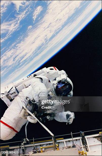 American astronaut Scott Parazynski during space walk while on Mir repair mission 01 October 1997. Parazynski and his Russian colleague Vladimir...