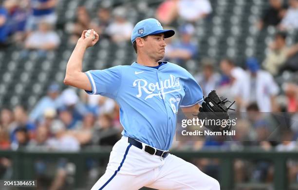 Seth Lugo of the Kansas City Royals delivers a second inning pitch against the Chicago Cubs during a spring training game at Surprise Stadium on...