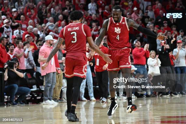 Juwan Gary of the Nebraska Cornhuskers and Brice Williams celebrate a basket against the Minnesota Golden Gophers in the second half at Pinnacle Bank...