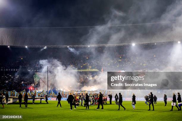 Supporters of Feyenoord with a banner and firework during the Dutch KNVB Beker match between Feyenoord v FC Groningen at the Stadium Feijenoord on...