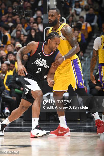 Kawhi Leonard of the LA Clippers and LeBron James of the Los Angeles Lakers during the game on February 28, 2024 at Crypto.Com Arena in Los Angeles,...