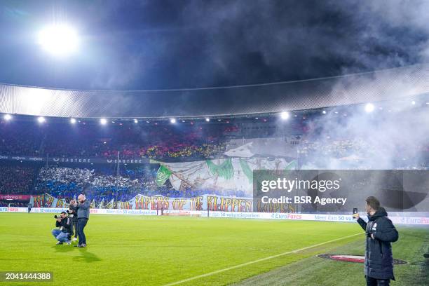 Fans of FC Groningen using fireworks, creating a curtain of smoke during the TOTO KNVB Cup Semi Final match between Feyenoord and FC Groningen at...