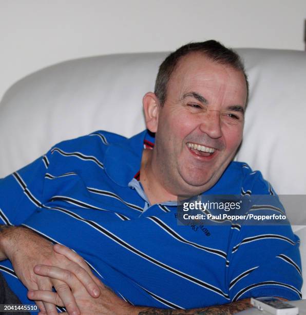 British darts champion Phil 'The Power' Taylor at home on December 21, 2010 in Stoke-on-Trent, England.