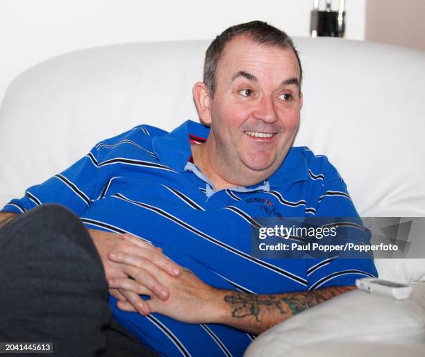 British darts champion Phil 'The Power' Taylor at home on December 21, 2010 in Stoke-on-Trent, England.