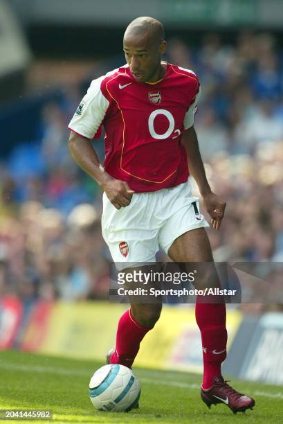 August 15: Thierry Henry of Arsenal on the ball during the Premier League match between Everton and Arsenal at Goodison Park on August 15, 2004 in...
