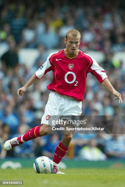 August 15: Fredrik Ljungberg of Arsenal running during the Premier League match between Everton and Arsenal at Goodison Park on August 15, 2004 in...