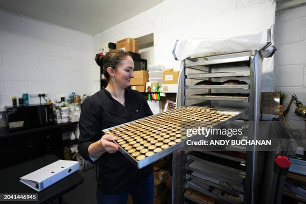 Chocolatier and owner of Fetcha Chocolates, Fiona McArthur prepares the vegan chocolates created in honour of the movie "Poor Thing" for the 2024...