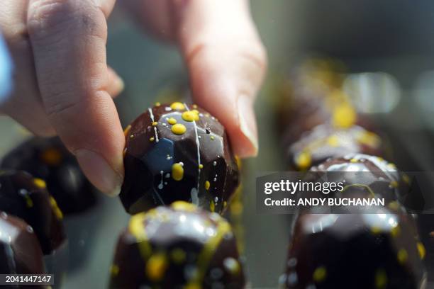 Photograph taken on February 14, 2024 shows the vegan chocolates created in honour of the movie "Killers of the Flower Moon" by Chocolatier and owner...