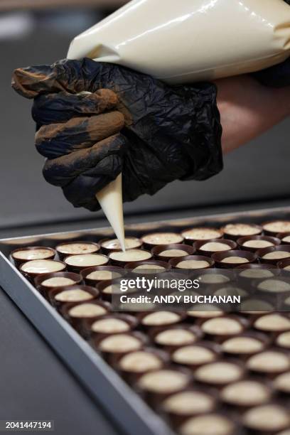 Chocolatier and owner of Fetcha Chocolates, Fiona McArthur prepares the vegan chocolates in honour of the movie "Poor Thing" for the 2024 Academy...