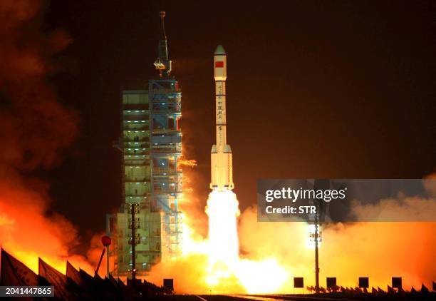 China's Long March 2F rocket carrying the Tiangong-1 module, or "Heavenly Palace", blasts off from the Jiuquan launch centre in Gansu province on...