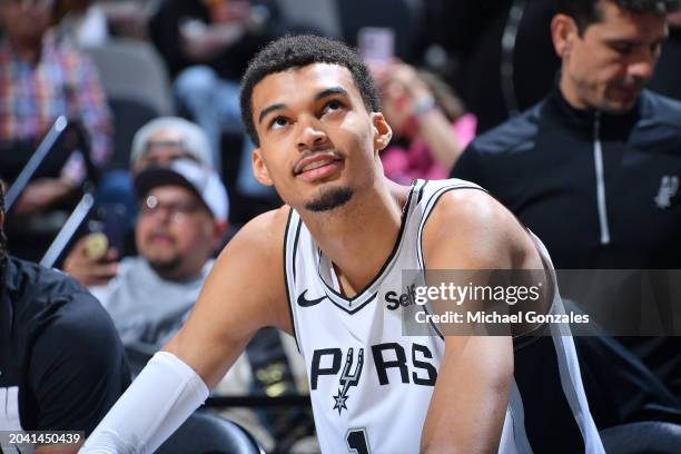 Victor Wembanyama of the San Antonio Spurs smiles before the game against the Oklahoma City Thunder on February 29, 2024 at the Frost Bank Center in...