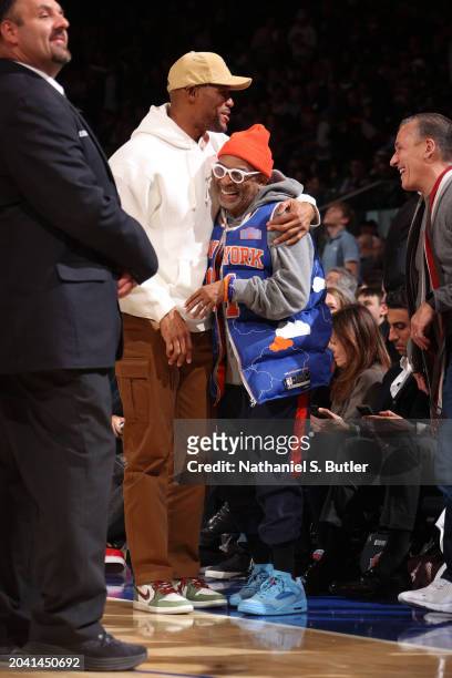 Michael Strahan hugs Spike Lee during the game between the Golden State Warriors and the New York Knicks on February 29, 2024 at Madison Square...