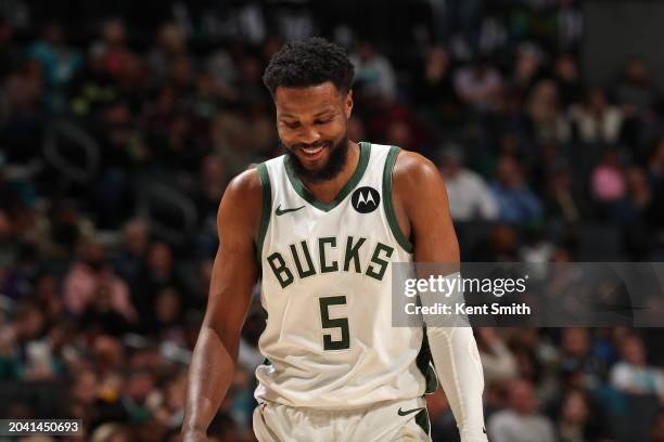 Malik Beasley of the Milwaukee Bucks smiles during the game against the Charlotte Hornets on February 29, 2024 at Spectrum Center in Charlotte, North...