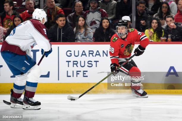 Connor Bedard of the Chicago Blackhawks handles the puck against the Colorado Avalanche in the first period at the United Center on February 29, 2024...