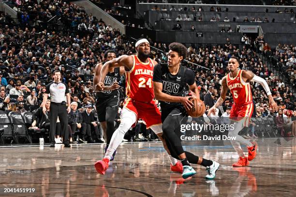 Cameron Johnson of the Brooklyn Nets drives to the basket during the game against the Atlanta Hawks on February 29, 2024 at Barclays Center in...