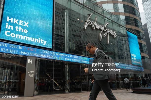 An electronic ticker at the Exchange Square Complex, which houses the Hong Kong Stock Exchange, in Hong Kong, China, on Thursday, Feb. 29, 2024. Hong...