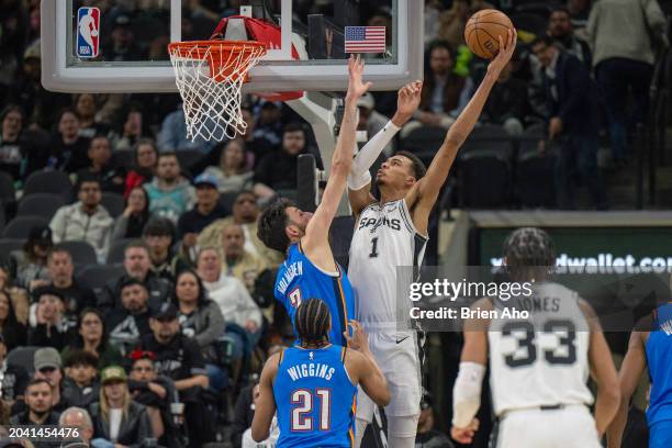 Forward Victor Wembanyama of the San Antonio Spurs drives to the basket during a game against the Oklahoma City Thunder at Frost Bank Center on...