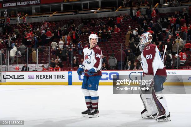 Mikko Rantanen and goalie Justus Annunen of the Colorado Avalanche celebrate after shutting out the Chicago Blackhawks 5-0 at the United Center on...