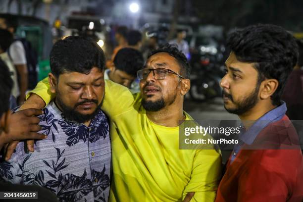Relatives of victims are searching for their loved ones following a fire that broke out in a multi-story building in Dhaka, Bangladesh, on February...