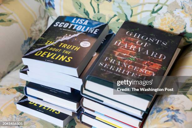 November 27: An armchair holds books by Lisa Scottoline and her daughter Francesca Serritella in Scottoline's home in Malvern, Pennsylvania on...