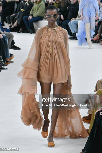 Model walks on the catwalk at the Chloe fashion show in Paris, France.