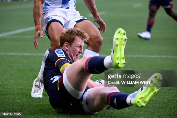 Highlanders player Rhys Patchell scores a try during the Super Rugby match between the Auckland Blues and the Otago Highlanders in Melbourne on March...
