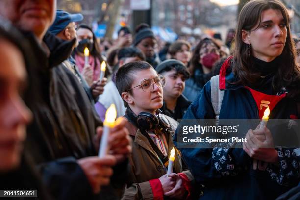 People gather outside the Stonewall Inn for a memorial and vigil for the Oklahoma teenager who died following a fight in a high school bathroom on...