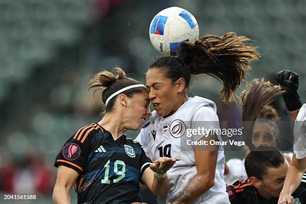 Mariana Larroquette of Argentina and Gabriella Cuevas of Dominican Republic head the ball during Group A - 2024 Concacaf W Gold Cup match at Dignity...