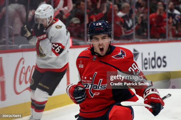 Hendrix Lapierre of the Washington Capitals celebrates after scoring a goal against the Ottawa Senators during the second period at Capital One Arena...