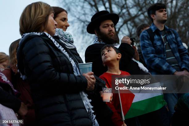 People participate in a vigil for U.S. Air Force active-duty airman Aaron Bushnell outside the Israeli Embassy on February 26, 2024 in Washington,...