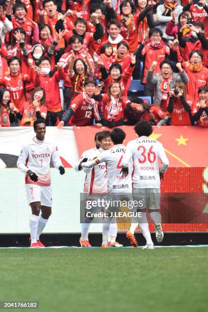 Jo of Nagoya Grampus celebrates with teammates after scoring the team's third goal during the J.League J1 match between Gamba Osaka and Nagoya...