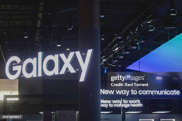 Galaxy logo sits illuminated at the Samsung booth in the Mobile World Congress 2024 on February 26, 2024 in Barcelona, Spain.