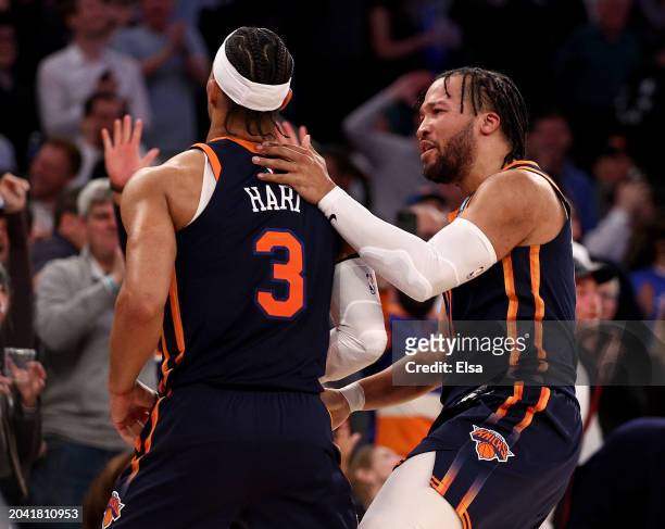 Josh Hart and Jalen Brunson of the New York Knicks celebrate the game winning basket in the final minutes of the game against the Detroit Pistons at...