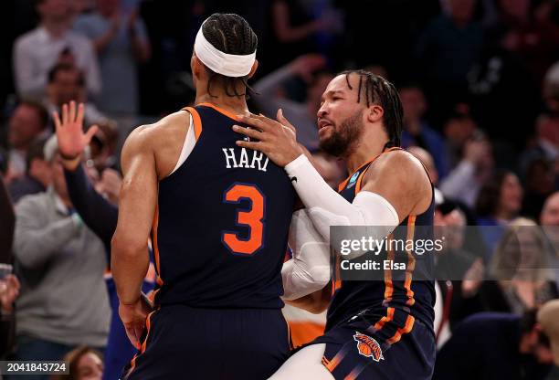 Josh Hart and Jalen Brunson of the New York Knicks celebrate the game winning basket in the final minutes of the game against the Detroit Pistons at...