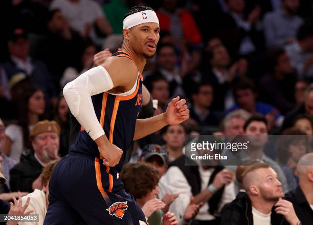 Josh Hart of the New York Knicks celebrates his three point shot during the second half against the Detroit Pistons at Madison Square Garden on...