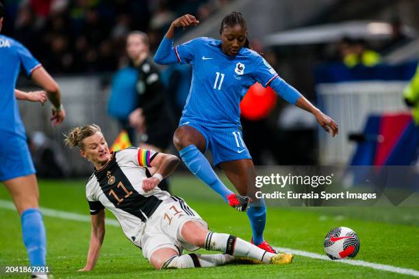 Kadidiatou Diani of France is challenged by Alexandra Popp of Germany during the UEFA Women's Nations League semi-final match between France and...