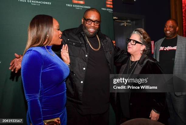 Shana Render, Killer Mike and Tammy Hurt attend Killer Mike Grammy Celebration at Knife Modern Mediterranean on February 25, 2024 in Atlanta, Georgia.