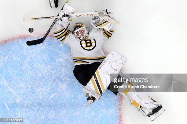 Linus Ullmark of the Boston Bruins makes a save against the Seattle Kraken during the third period at Climate Pledge Arena on February 26, 2024 in...