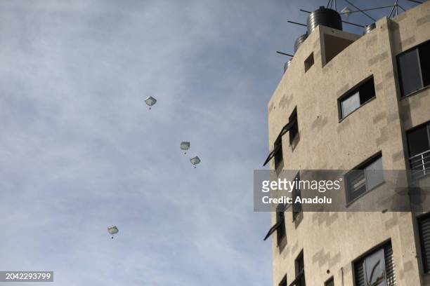 Humanitarian aid packages dropped from the air by Jordanian army planes are seen floating on the sky in Gaza City, Gaza on March 01, 2024. Operation...