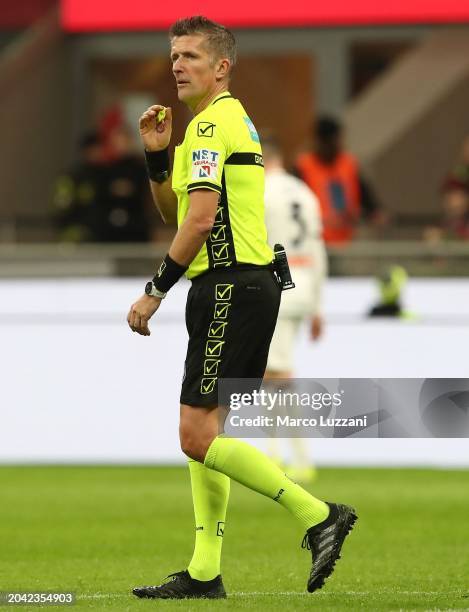 Referee Daniele Orsato looks on during the Serie A TIM match between AC Milan and Atalanta BC at Stadio Giuseppe Meazza on February 25, 2024 in...