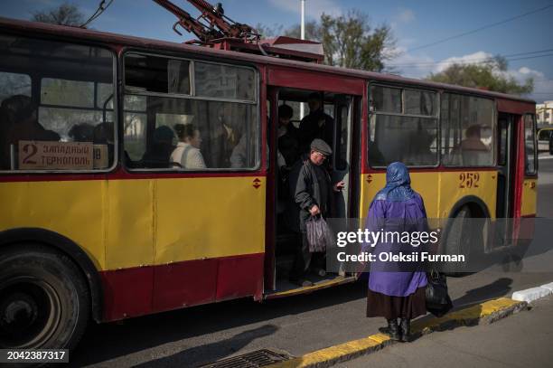 An elderly man exits a trolleybus on April 7, 2014 in Tiraspol, Moldova.