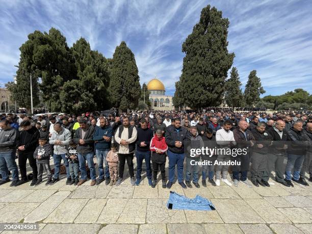 Number of Palestinians perform Friday prayer at Al-Aqsa Mosque as the Israeli forces continue to impose restriction to Palestinians from entering the...