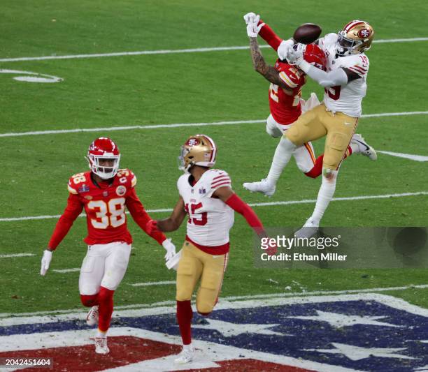 Cornerback Trent McDuffie of the Kansas City Chiefs breaks up a pass intended for wide receiver Deebo Samuel of the San Francisco 49ers in the third...
