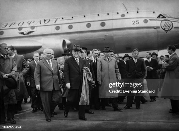 Soviet leader Nikita Khruschev with Soviet Premier, Nikolai Bulganin at London Airport viewing a new Aeroflot Tupolev TV-104 airliner, April 18th...