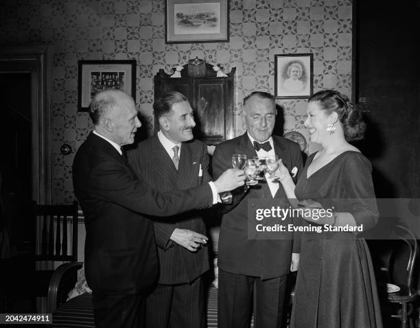 Playwrights Falkland Cary left, and Philip King , third right, with actor Cyril Smith and actress Peggy Mount , May 12th 1956.