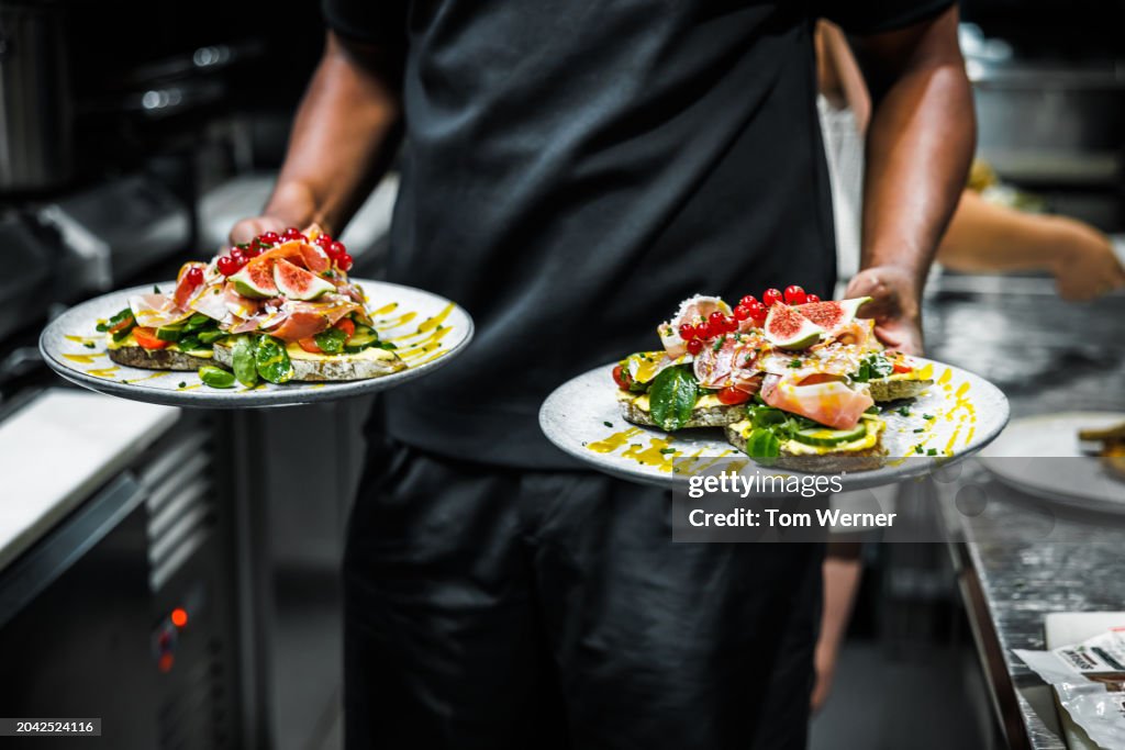 Chef Serving Gourmet Toast Delights