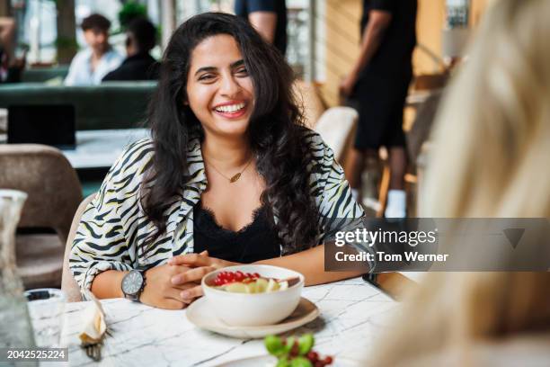 joyful encounter at the café - two zebras stock pictures, royalty-free photos & images