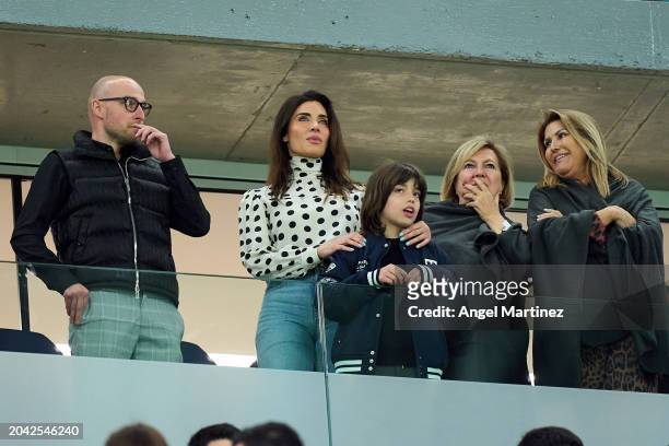 Spanish Presenter Pilar Rubio, Wife of Sergio Ramos of Sevilla FC , and her son Sergio Ramos Rubio, look on from the stands prior to during the...