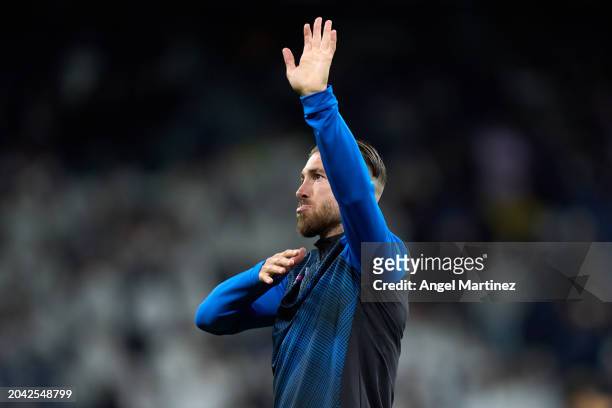 Sergio Ramos of Sevilla FC acknowledges the fans as he warms up prior to the LaLiga EA Sports match between Real Madrid CF and Sevilla FC at Estadio...