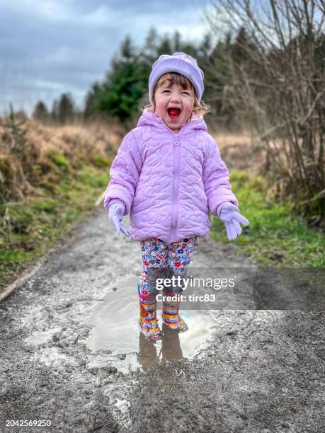 two year female toddler lifestyle shoot - charco fotografías e imágenes de stock